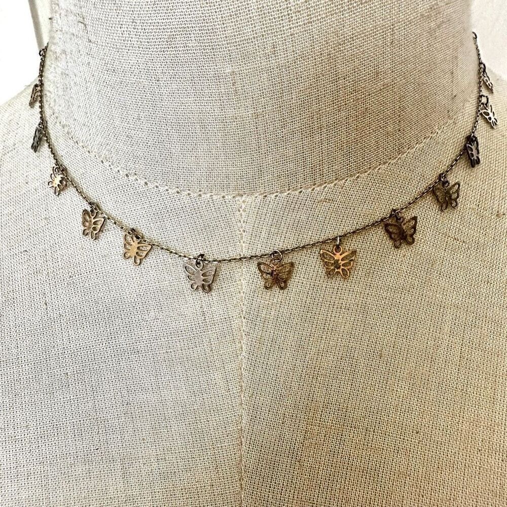 Gold tone butterfly choker necklace